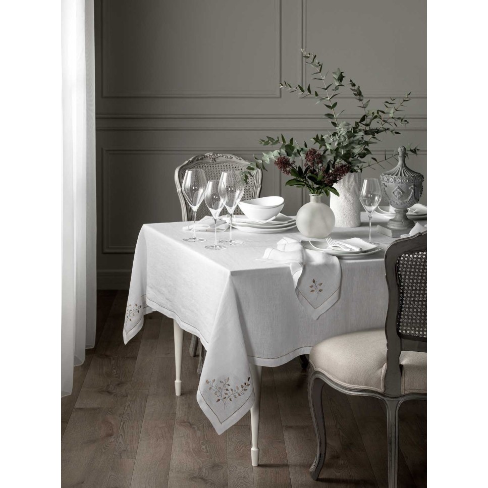 Table with white tablecloth clearance